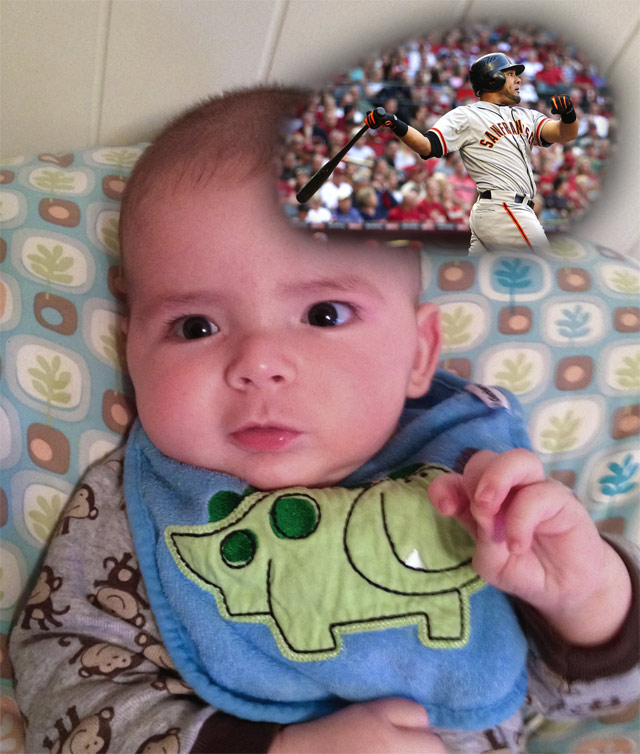 baby boy max wearing a dinosaur bib, sitting on a Boppy Newborn Lounger, reflects on Giants' Opening Day 2012 with a home run by Melky Cabrera