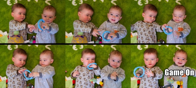Twin baby boys Max and Sam tussle over a teething toy. Max won this round.
